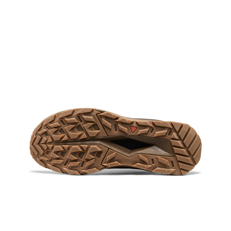 Tan rubber outsole with geometric tread and red triangular logo on men’s targhee apex waterproof hiking shoe heel