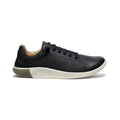 Men's KNX leather sneaker in black with white rubber sole and olive green heel accent shown