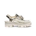 Silver metallic leather platform sandal with white woven strap and tassel detail from allegender