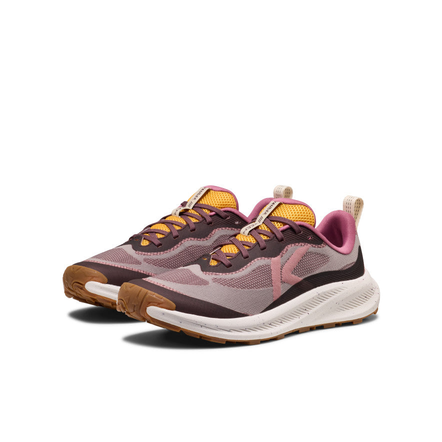 Women's wander trail running shoe in purple and yellow mesh with white midsole and brown outsole