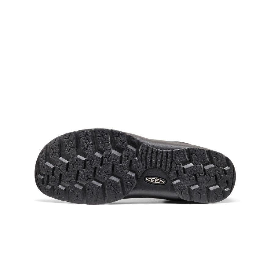 Black rubber sole with deep aggressive tread and keen logo embossed in the center of men's jasper