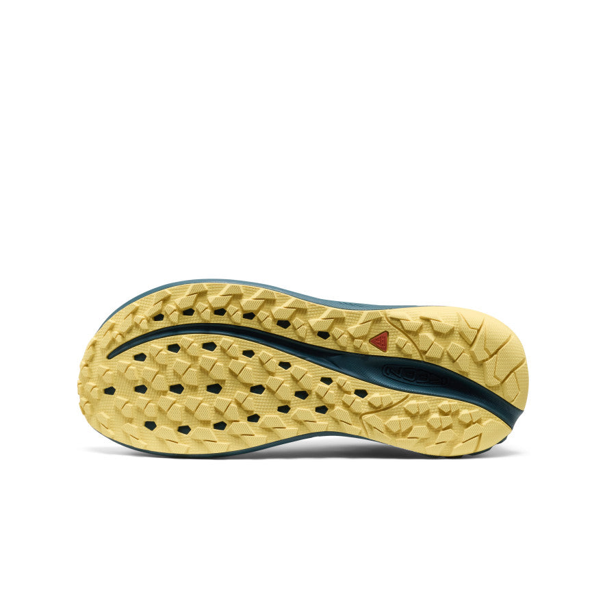 Yellow and teal textured geometric tread sole of women's Roam trail running shoe aquifer