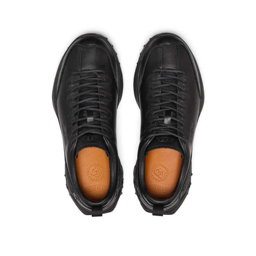 Men's Jasper Zionic SE1 leather sneaker in flux black with chunky sole, laces, and orange insole