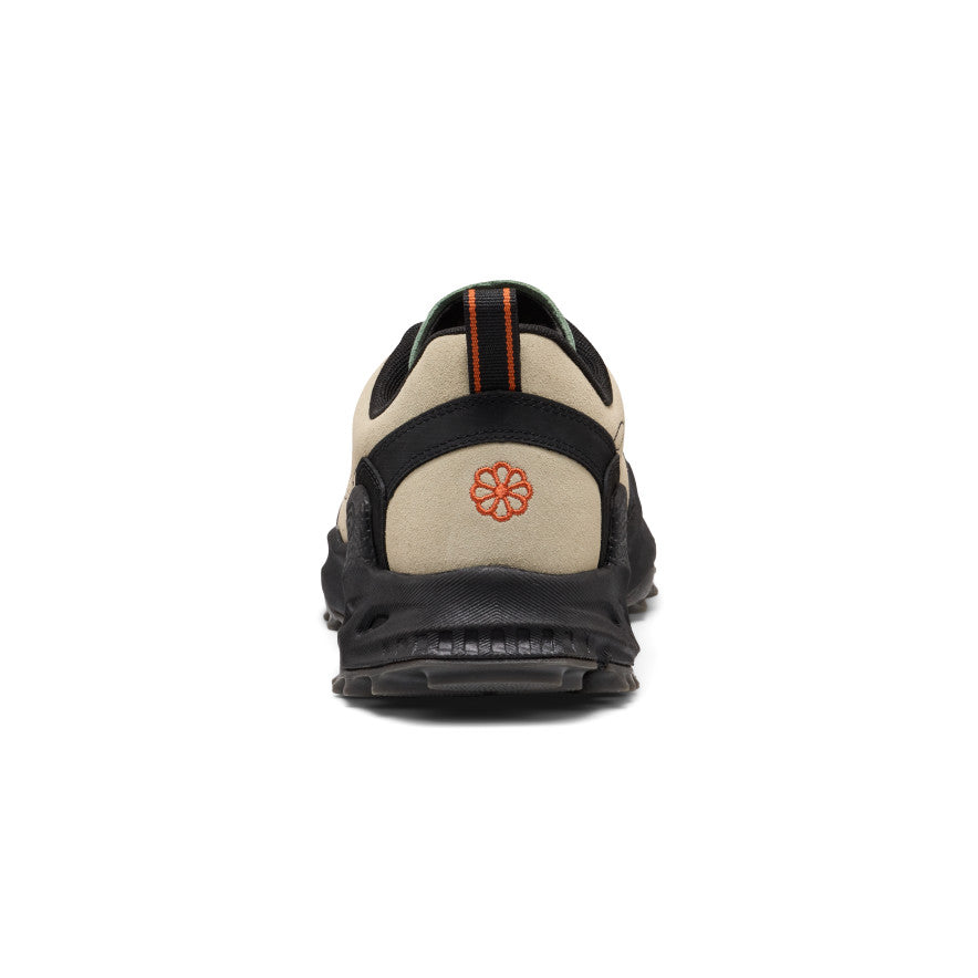 Back side of men's jasper zionic sneaker in abbey stone and lily pad with textured sole and orange