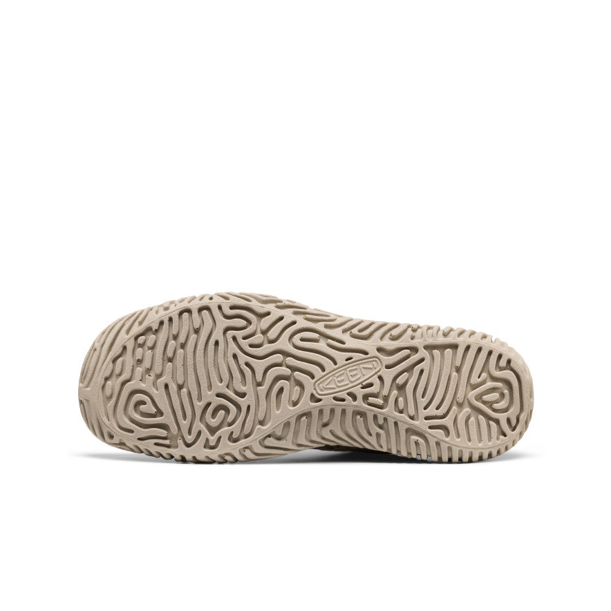 Close-up of men's jasper merko sneaker tan rubber sole with intricate maze-like tread pattern