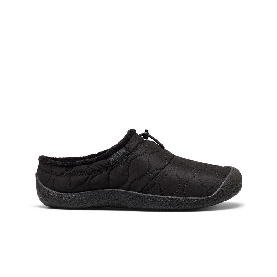 Pair of black loafers on a light gray background