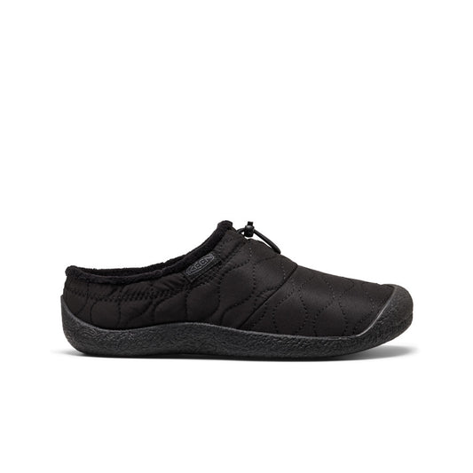 Pair of black loafers on a light gray background