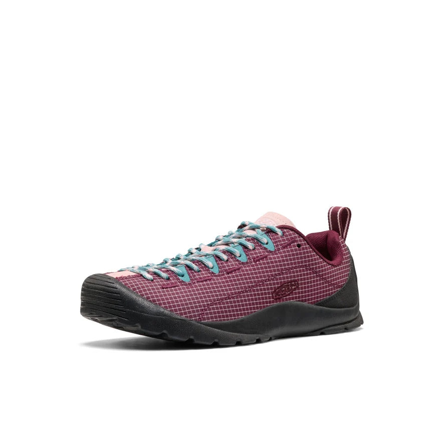 Angled view of burgundy hybrid shoe with durable rubber toe cap