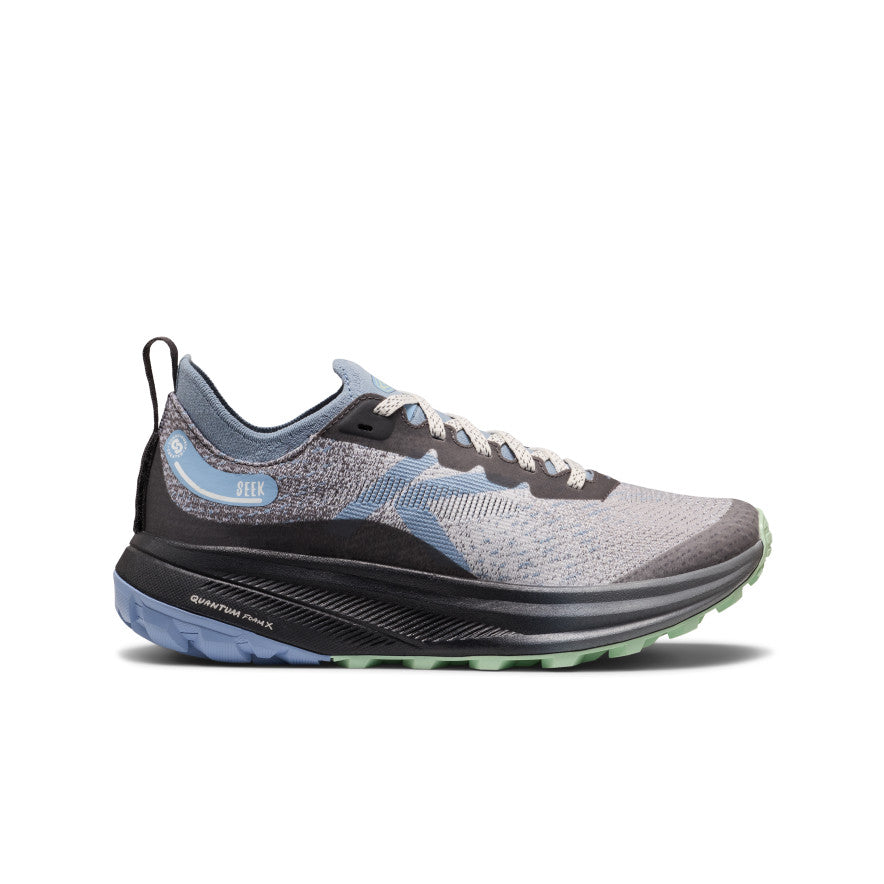 Women’s seek trail running shoe in magnet and scenic green with gray and blue knit upper and quantum foam x midsole