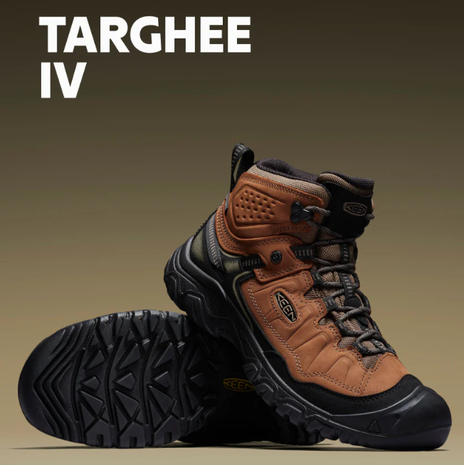 Brown hiking boot with black sole on a beige background, featuring the brand 'KEEN'.