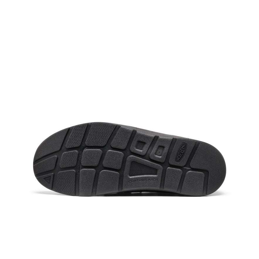 Men's UNEEK Loafer - Nocturnal Cow Red Black rubber sole of men’s uneek loafer in nocturnal cow red with textured grid tread and keen logo near the heel - Image 1