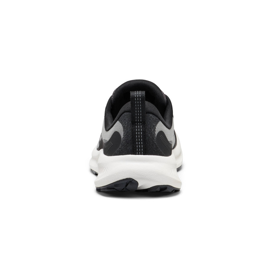 Women's Wander Trail Running Shoe - Black/Magnet Black and gray Nike women's Wander trail running shoe with white midsole and textured rubber - Image 1