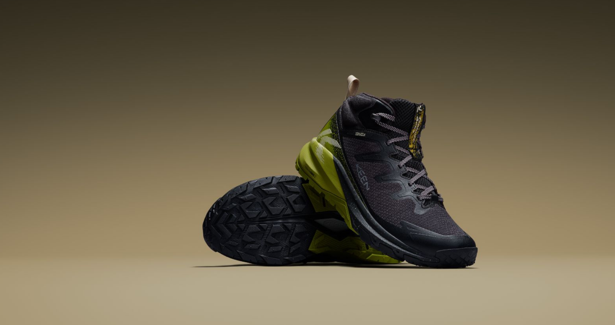 black and green targhee apex show on a beige background