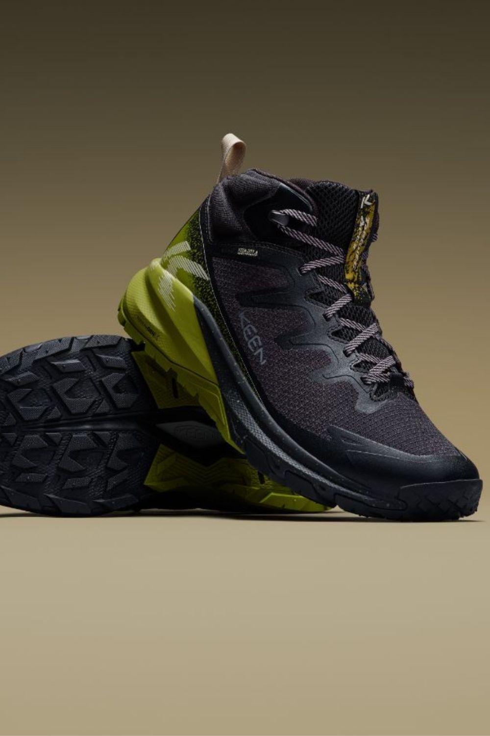 black and green targhee apex show on a beige background