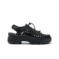Black woven macramé all gender UNEEK PLT sneaker with chunky rubber sole and adjustable ankle strap