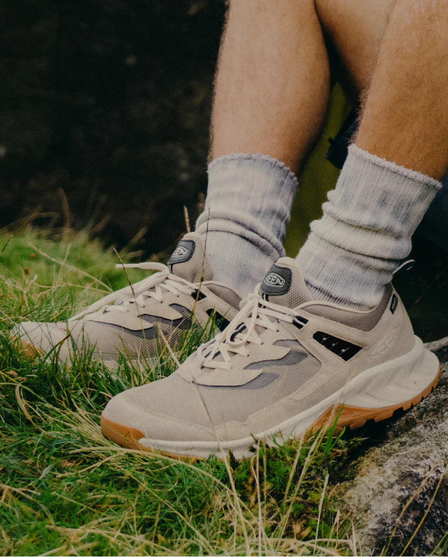 keen hightrail hiking shoes pictures in a natural grassy setting.