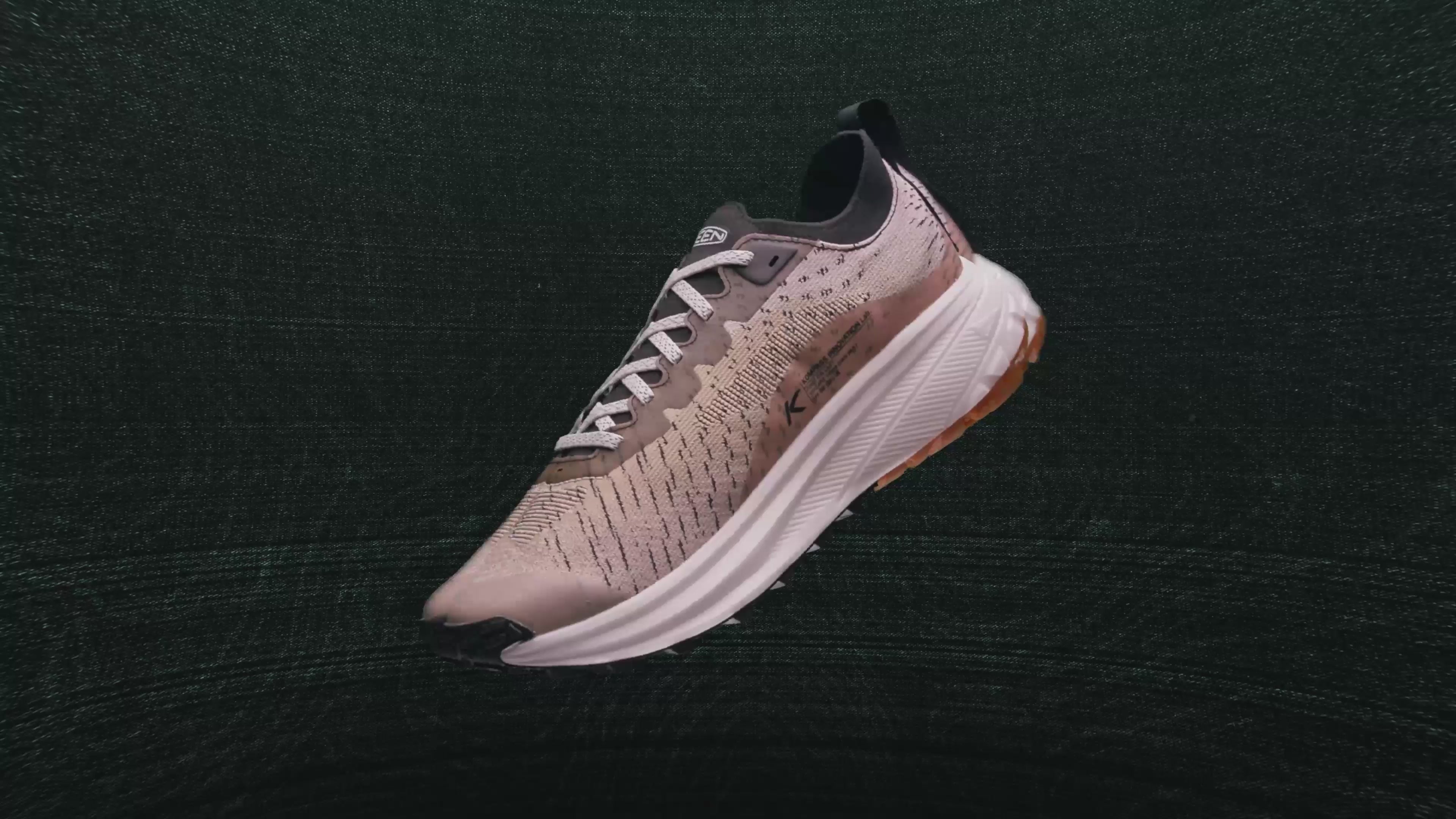 Load video: a short video showing a rotating keen seek trail running shoe.