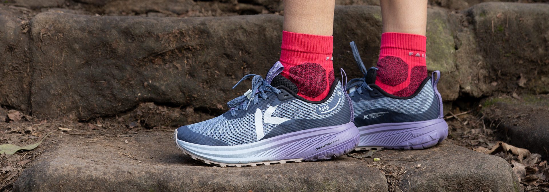 Person wearing Roam Trail Running Shoes on a stone surface